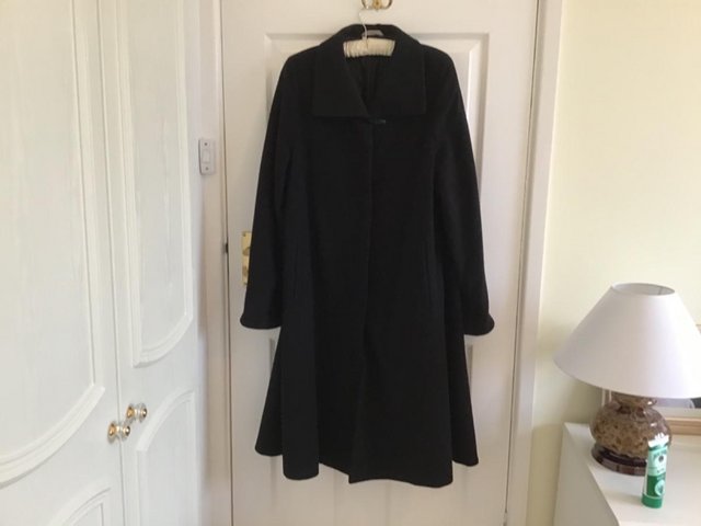 Preview of the first image of Marks and Spencer’s Ladies Black Coat..