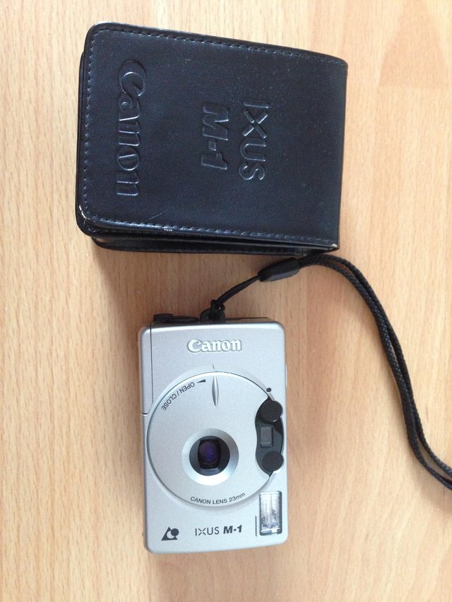 Preview of the first image of Cannon IXUS M-1 Camera with case.