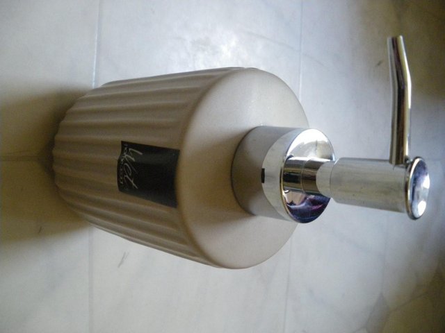 Preview of the first image of Home Design Linea Lotion Dispenser BNWT.