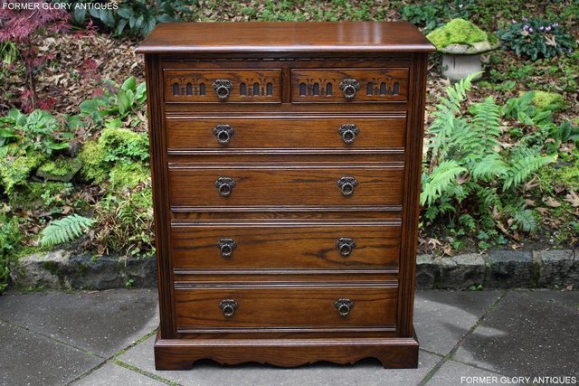 Preview of the first image of OLD CHARM LIGHT OAK TALL CHEST OF DRAWERS TV STAND SIDEBOARD.