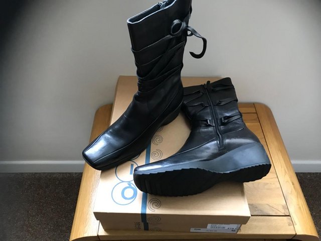Preview of the first image of Black Leather Boots from Pettits- new in box.