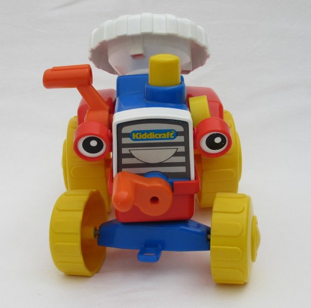 Preview of the first image of Kiddicraft Action Tractor – Vintage.