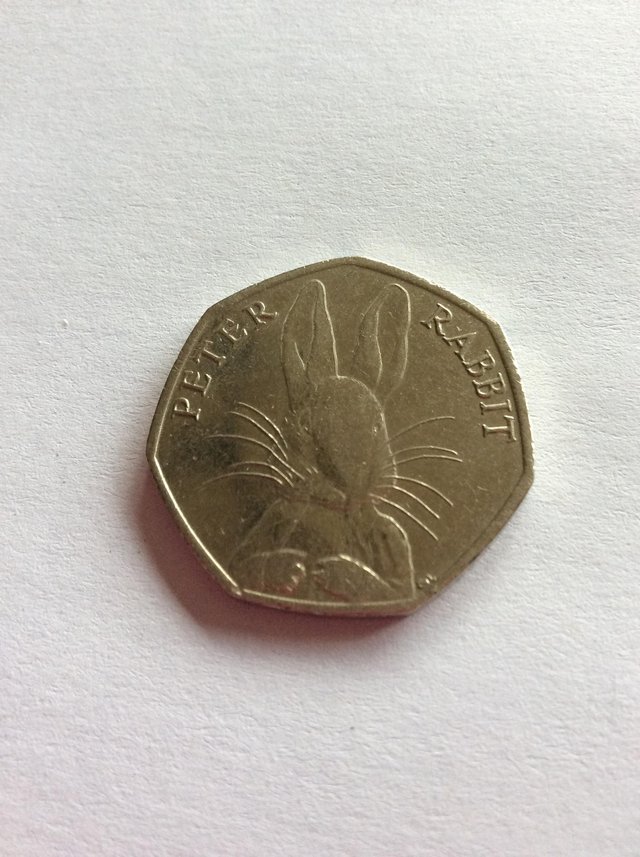 Preview of the first image of 2016 Peter Rabbit 50p coin..