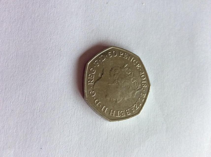 Preview of the first image of 2018 Paddington bear at the palace 50p coin.