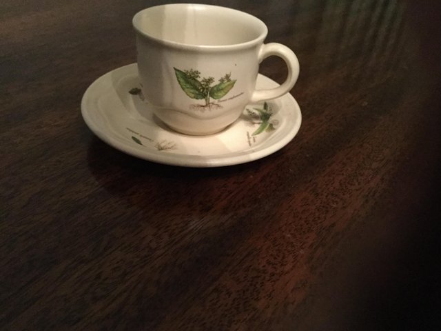 Preview of the first image of Poole pottery coffee cup and saucer.