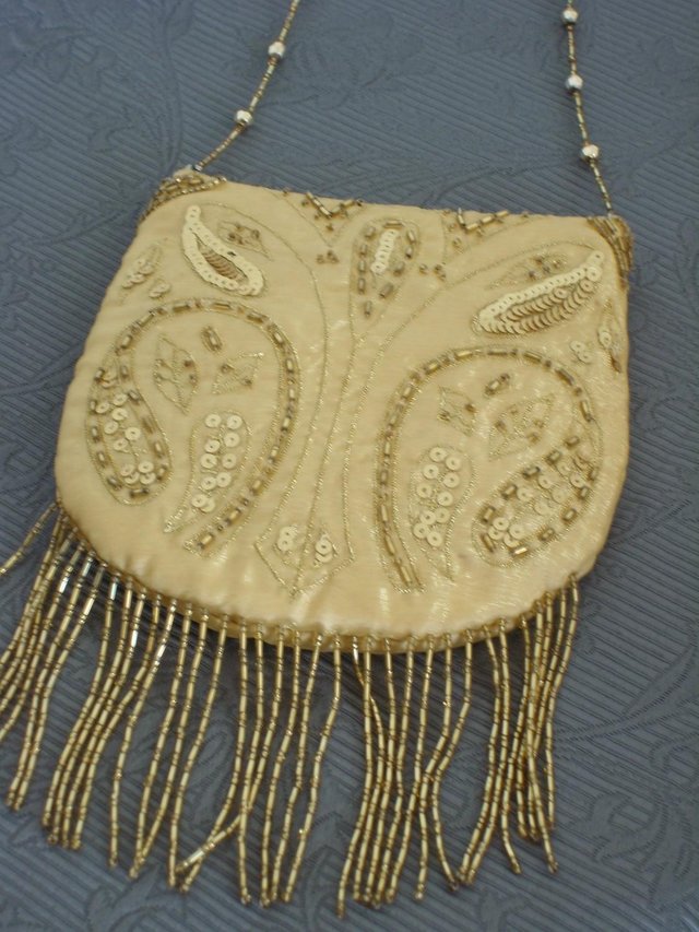 Preview of the first image of DEBUT Gold Bead Fringed Evening Bag NEW!.