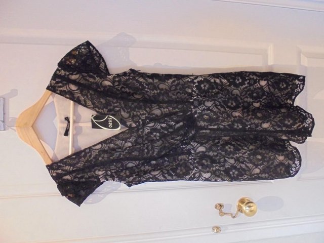 Preview of the first image of Oasis Ladies Black Lace playsuit, Size 10 - unworn.