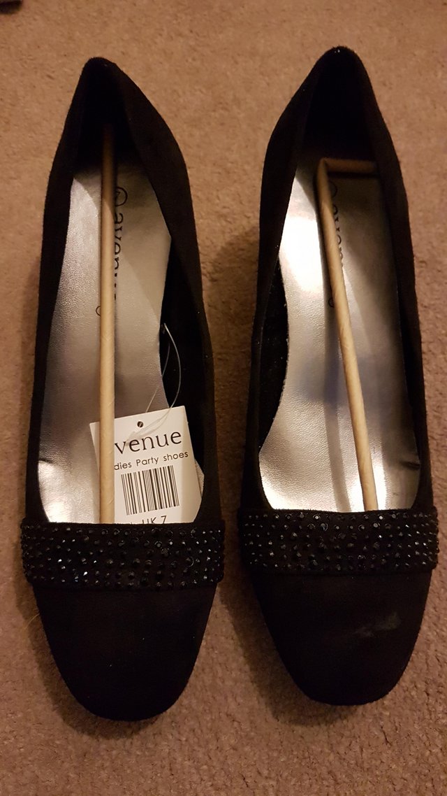 Preview of the first image of Ladies court shoe black *brand new never worn*.
