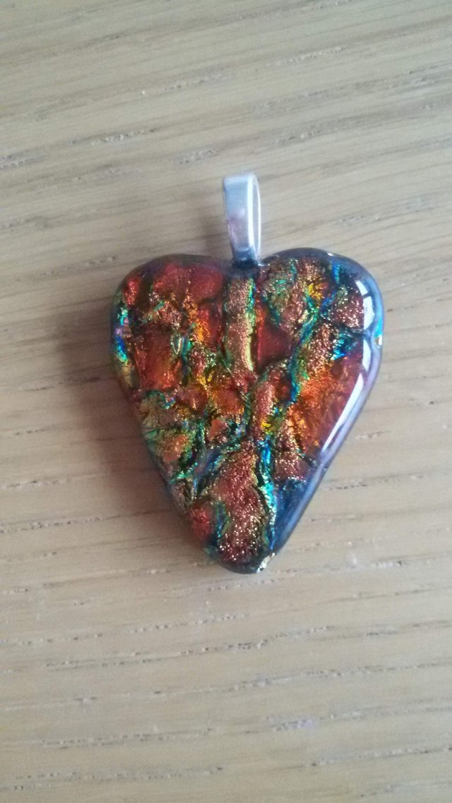 Preview of the first image of beautiful hand-made glass heart pendant.