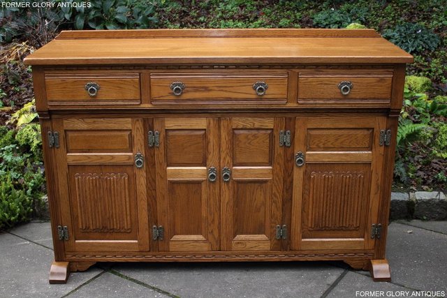 Preview of the first image of AN OLD CHARM VINTAGE OAK SIDEBOARD DRESSER BASE HALL CABINET.
