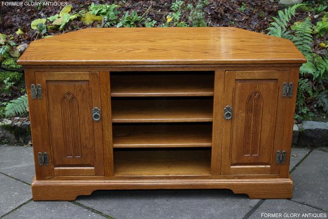 Preview of the first image of OLD CHARM VINTAGE OAK CORNER TV DVD MEDIA CABINET STAND.