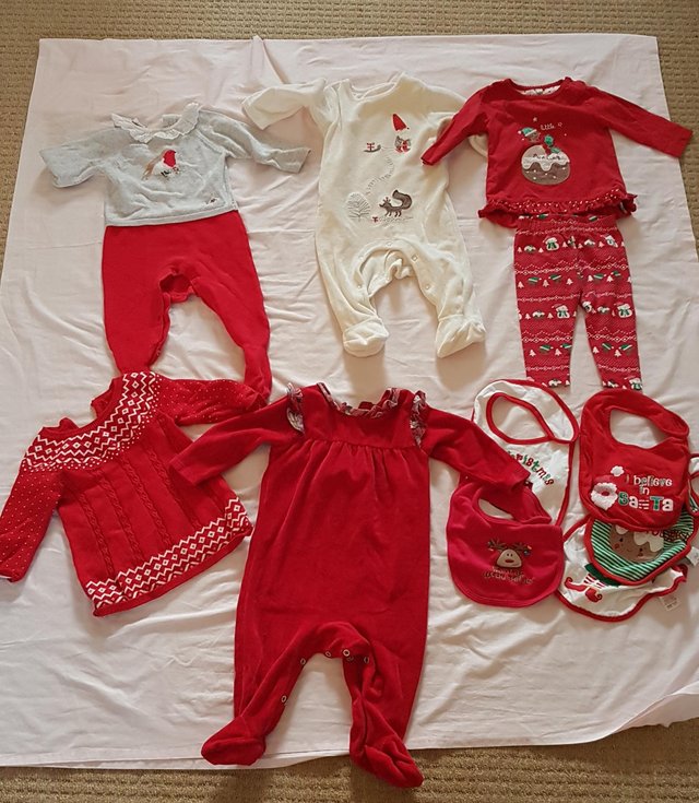 Preview of the first image of Christmas baby clothes reduced.