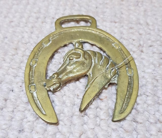 Preview of the first image of Three Genuine Antique Horse Brasses.