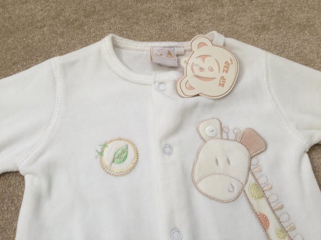 Preview of the first image of BNWT 3-6 mths baby sleep suit.
