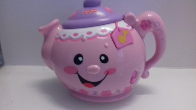 Preview of the first image of FISHER PRICE MUSICAL TALKING TEAPOT TOY.