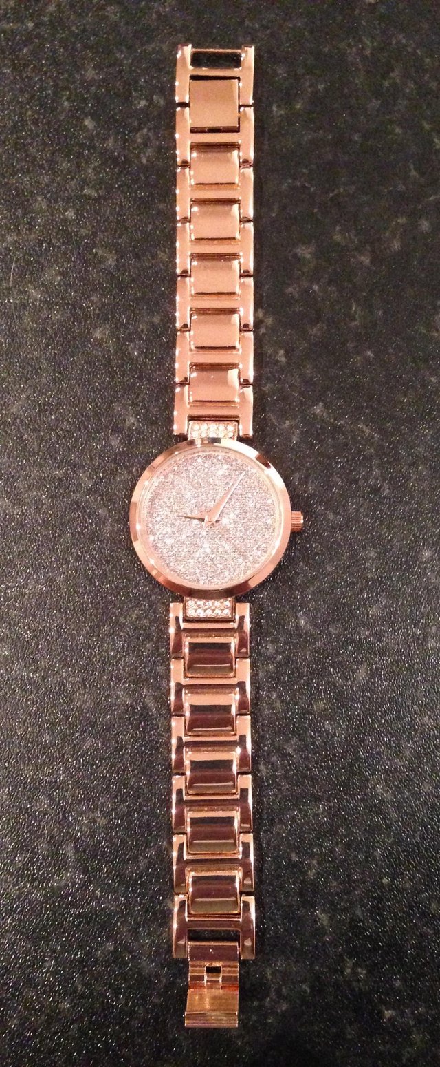 Preview of the first image of Rose gold colour ladies watch.