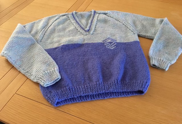 Preview of the first image of Hand Knitted Child's Jumper. Size 26/28".