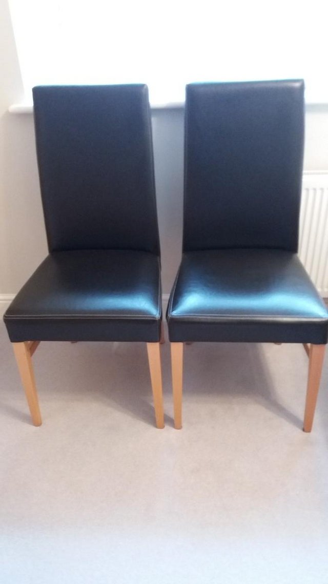 Preview of the first image of 2 x FAUX LEATHER HIGH BACK DINING CHAIRS.