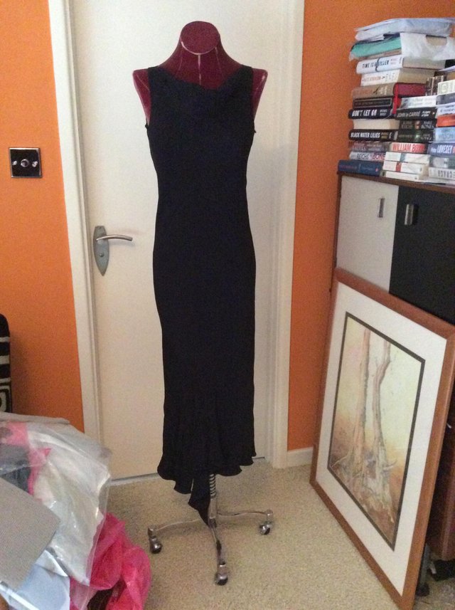 Preview of the first image of Black Evening Dress by Roland Mouret new with tags.