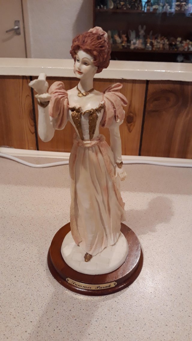 Preview of the first image of Lady figurine.