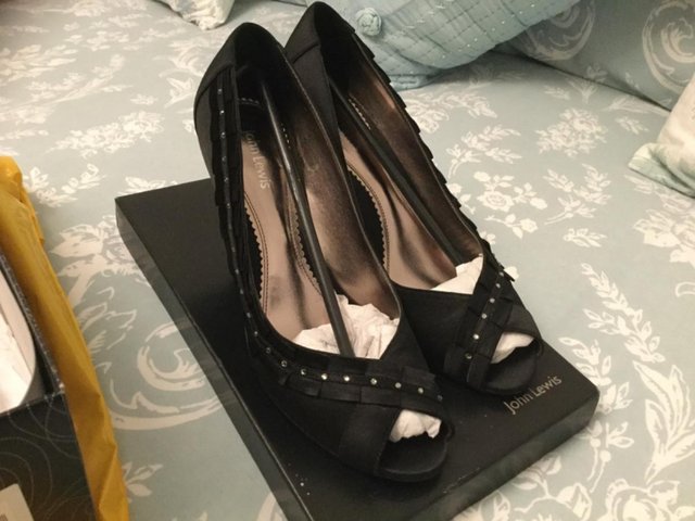 Preview of the first image of John Lewis- diamanté pleat black shoes.