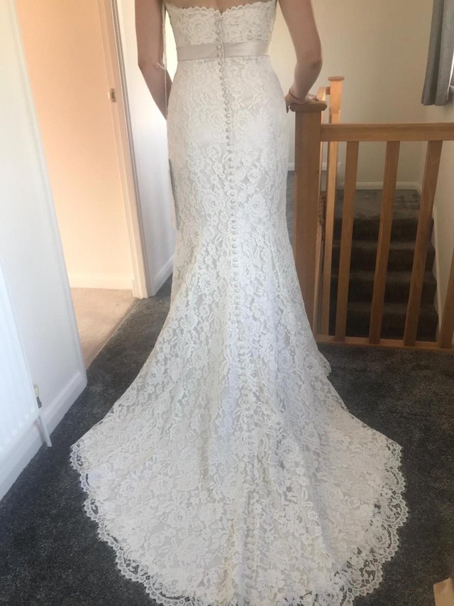 Preview of the first image of Brand new Never worn wedding dress.