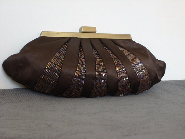 Preview of the first image of COUNTRY CASUALS Brown Beaded Clutch NEW!.