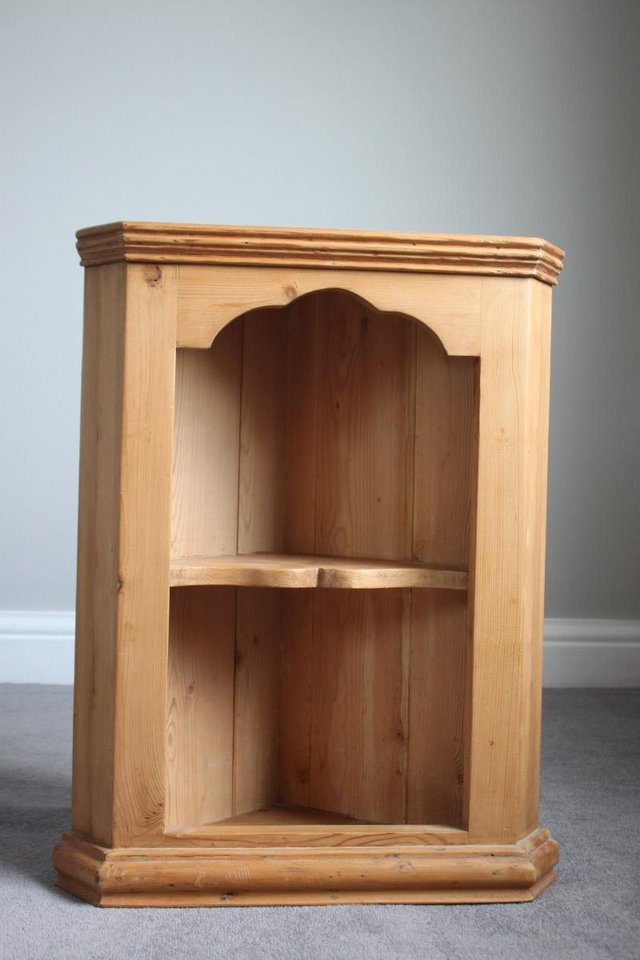 Preview of the first image of A solid wood Corner Cupboard..