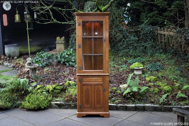 Preview of the first image of OLD CHARM VINTAGE OAK CORNER DISPLAY CABINET CUPBOARD STAND.