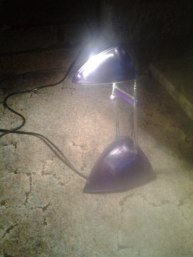 Preview of the first image of Pretty lilac reading light.