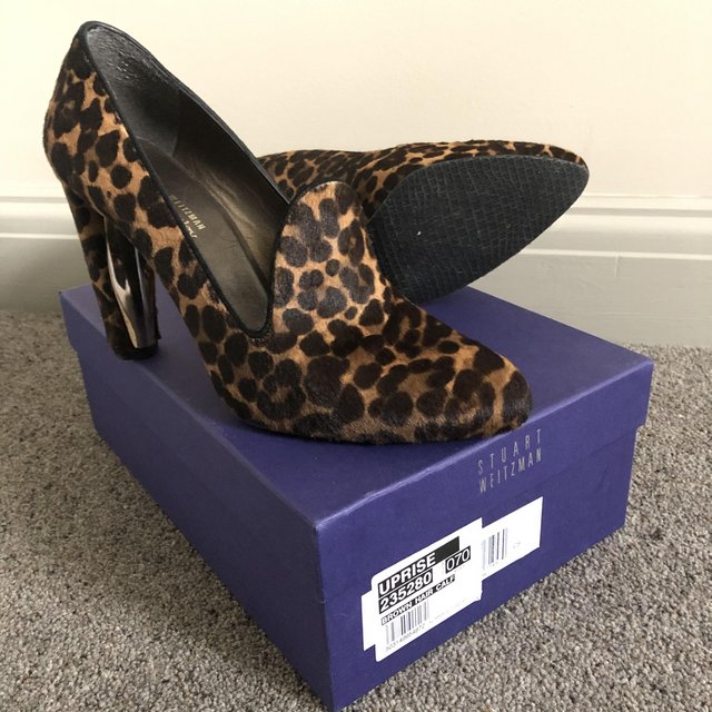 Preview of the first image of Stuart Weitzman Leopard Print Shoes.