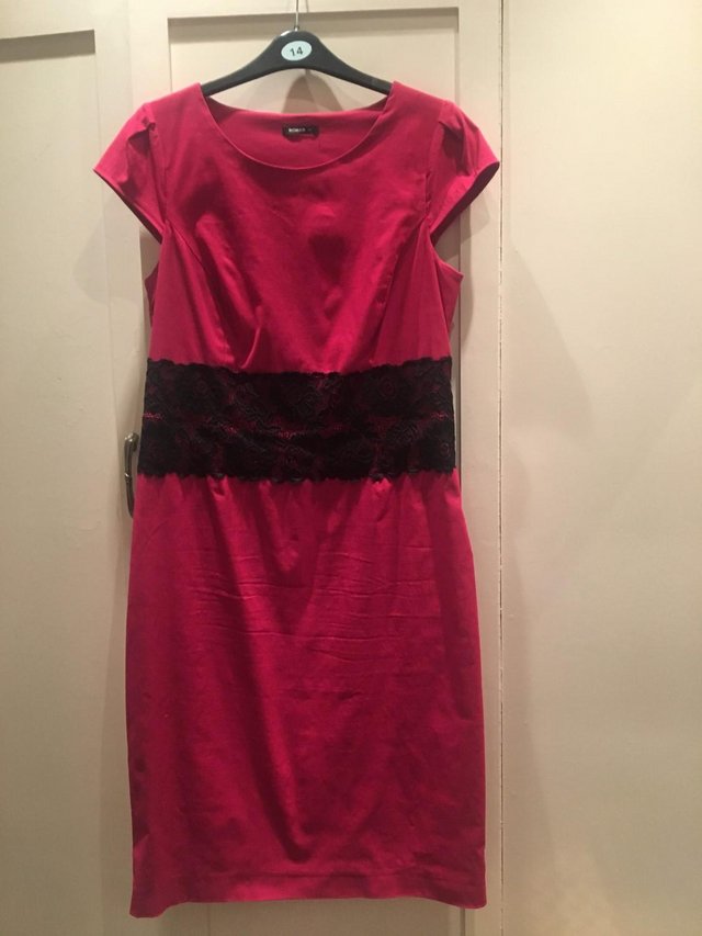 Preview of the first image of ROMAN Dark Pink Stretch Dress size 14.