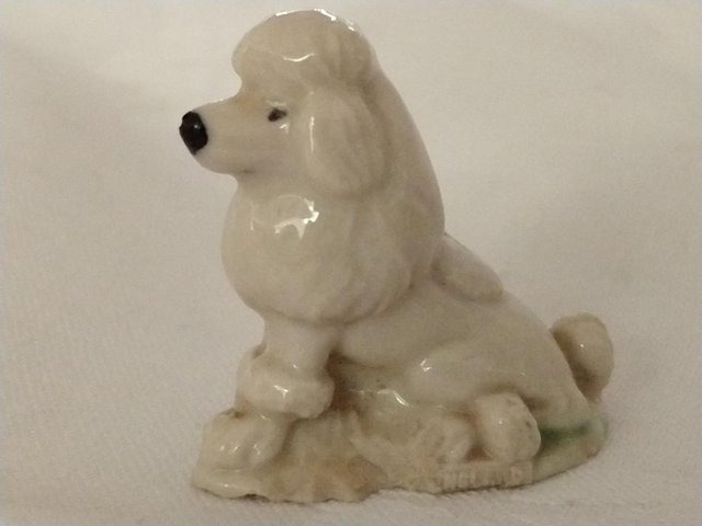 Preview of the first image of Vintage Wade Whimsies Standard Poodle Dog Canadian Red Rose.