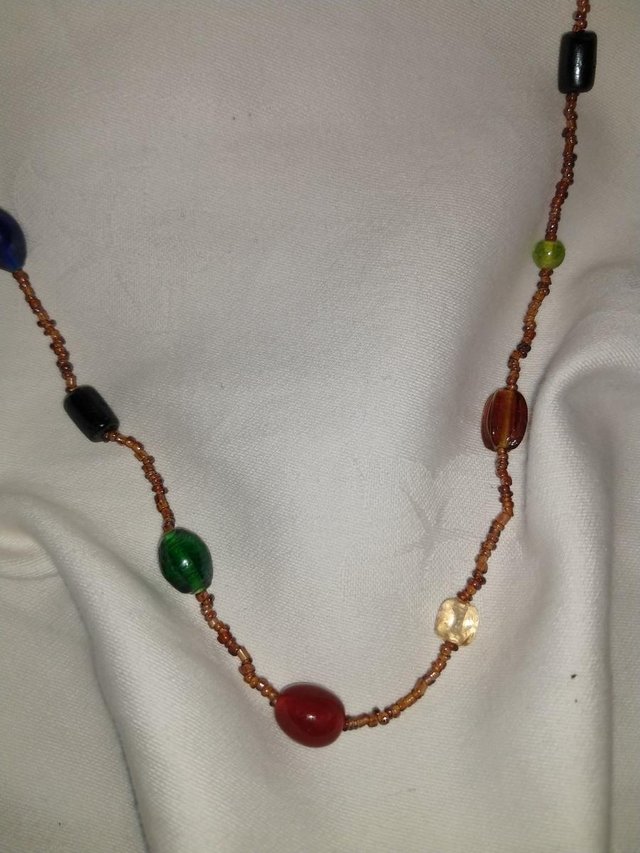 Preview of the first image of Long beaded necklace. IMMACULATE.