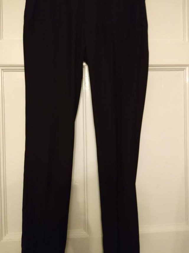 Preview of the first image of Cedar Wood State Slim Fit Black trousers 34" waist.Long..