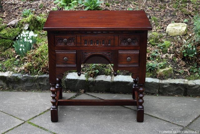 Preview of the first image of AN OLD CHARM TUDOR OAK SMALL WRITING TABLE DESK LAPTOP STAND.