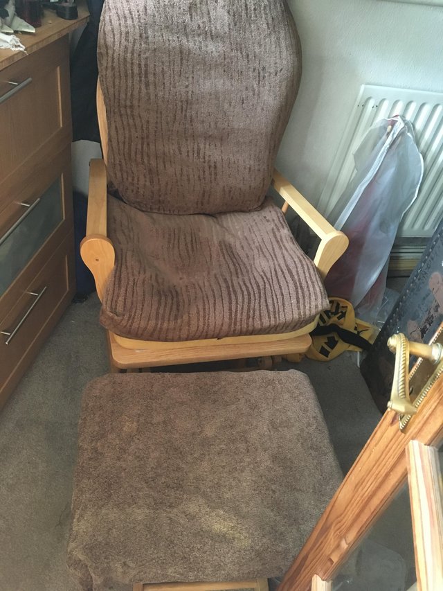 Preview of the first image of Nursing chair or rocking chair with foot rest.