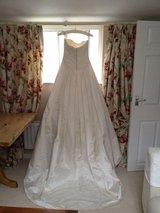 Preview of the first image of Wedding DressDuchess Silk Chapel Length Train.