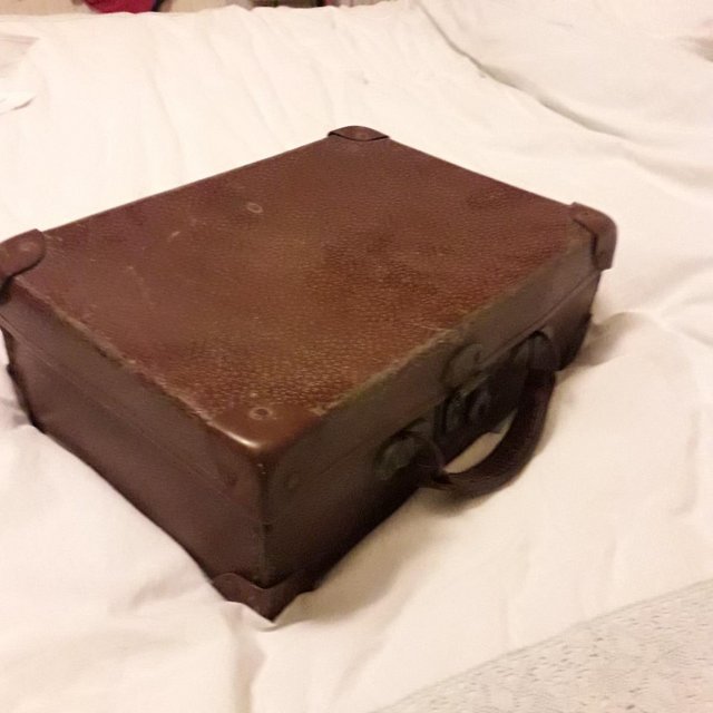 Preview of the first image of Antique small hand suitcase 1950s.