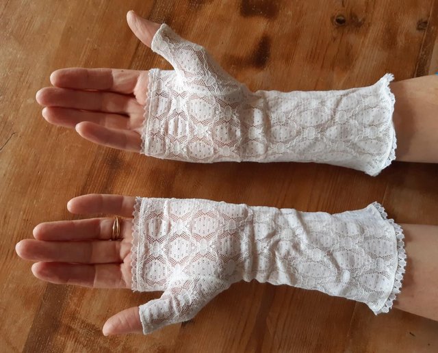 Preview of the first image of Pretty WHITE LACE Fingerless GLOVES.
