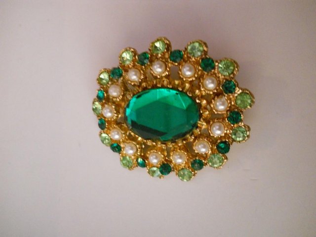 Preview of the first image of Vintage Costume Brooch with Green Stone in Centre.