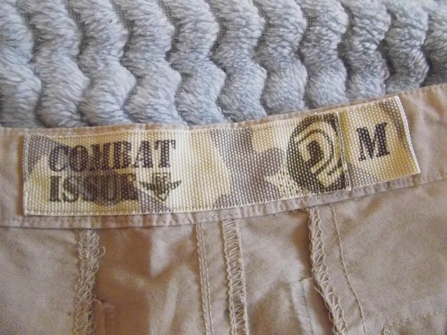 Preview of the first image of Combat Issue Trousers.