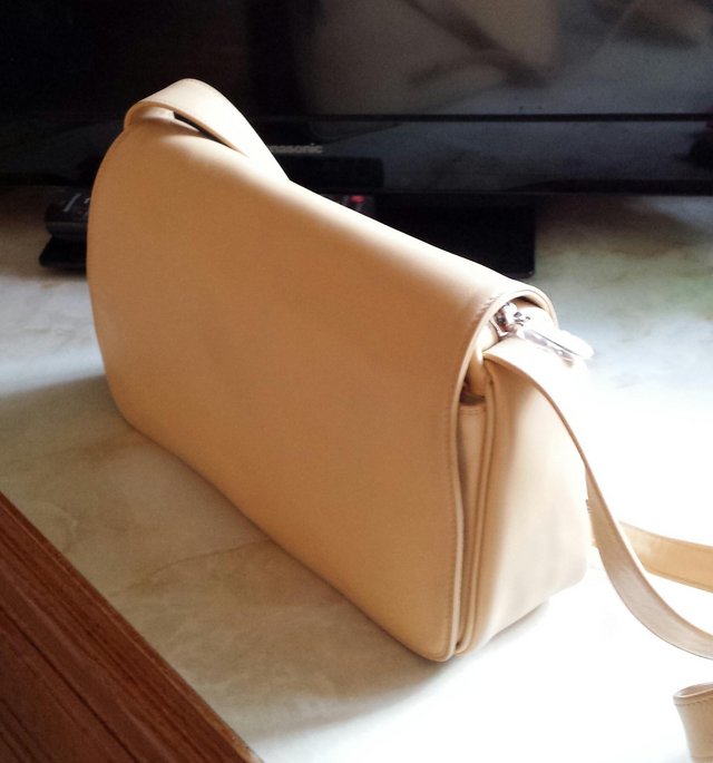 Preview of the first image of New Tula cream leather handbag.