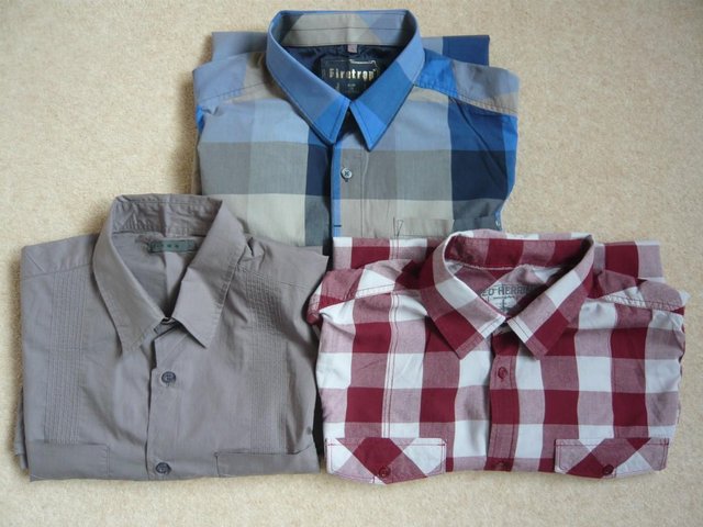 Preview of the first image of Shirts - three mens' short sleeved.