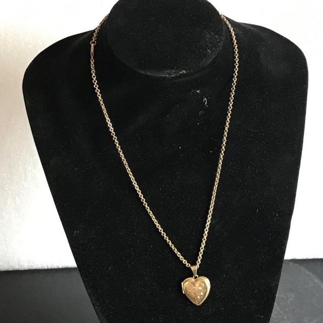 Preview of the first image of 9ct all solid gold long chain and gold locket.