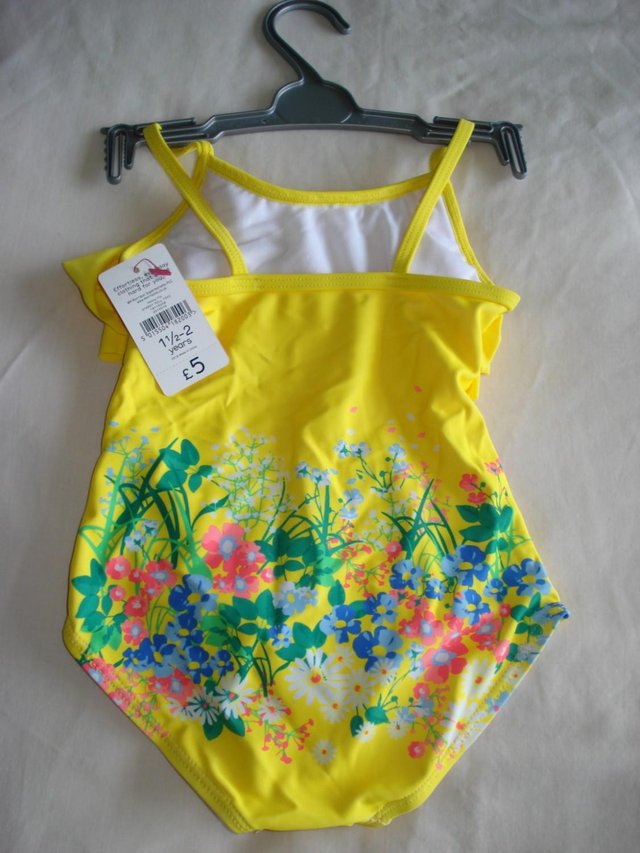 Preview of the first image of Brand New Girl's Swimming Costume, Buoyant Aid & 2 Arm Bands.
