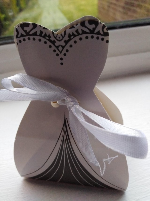 Preview of the first image of Bride and groom favour boxes.