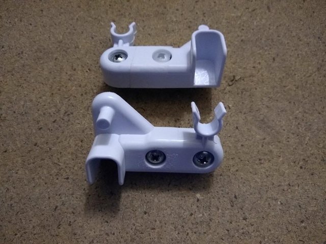 Preview of the first image of Indesit CAA55NF (UK) fridge freezer - freezer flap hinges.