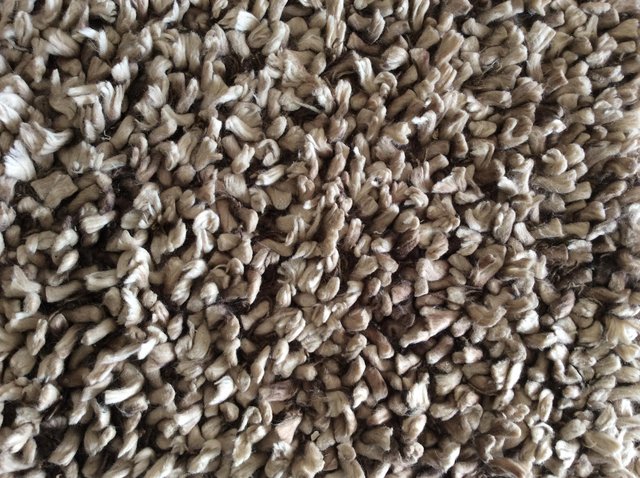 Preview of the first image of BEIGE/BROWN KNOTTY PILE RUG 170 x 110 AS NEW CONDITION.