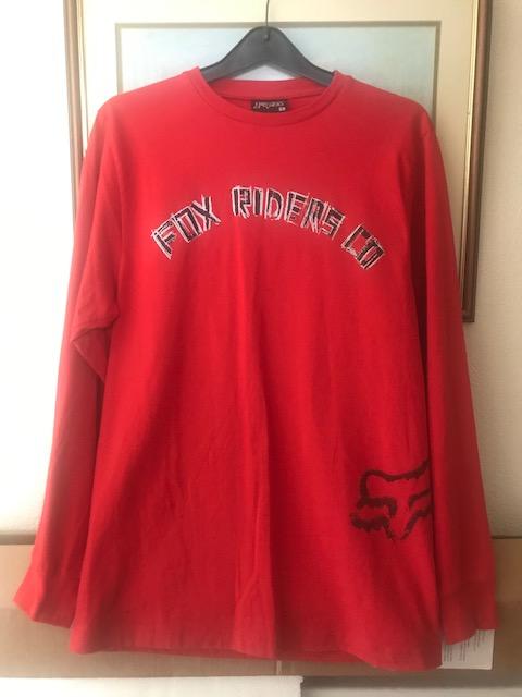 Preview of the first image of Fox long sleeved cycling top, red and black.